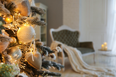 Closeup view of beautiful decorated Christmas tree indoors