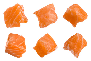 Set with pieces of fresh raw salmon on white background. Fish delicacy