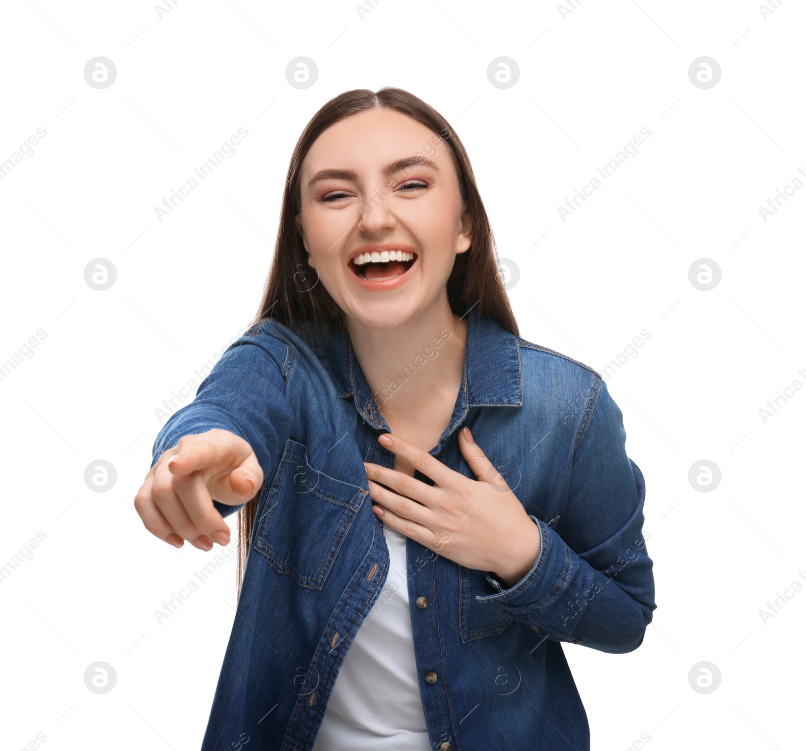 Photo of Beautiful woman pointing at something and laughing on white background