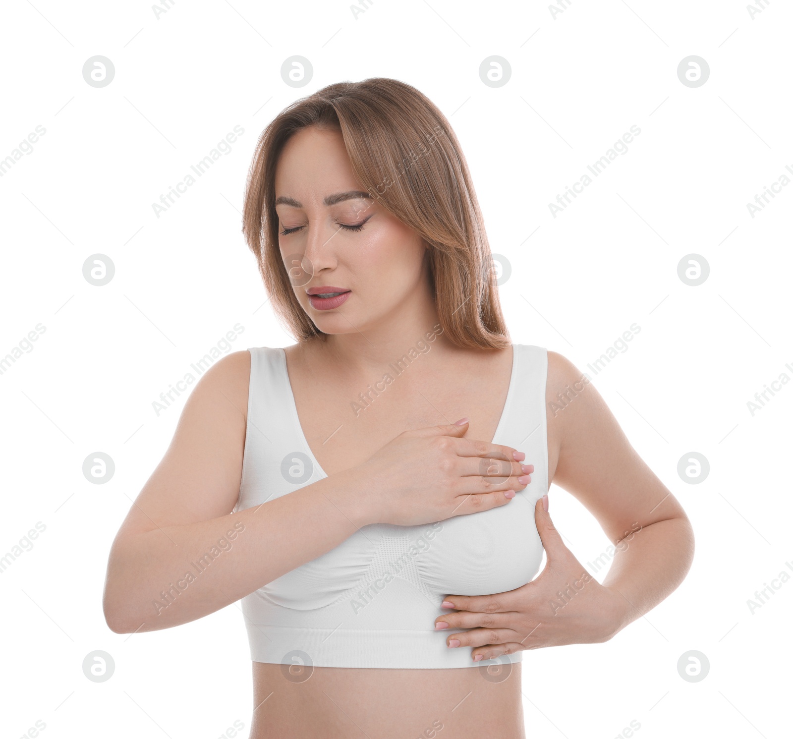 Photo of Mammology. Young woman doing breast self-examination on white background