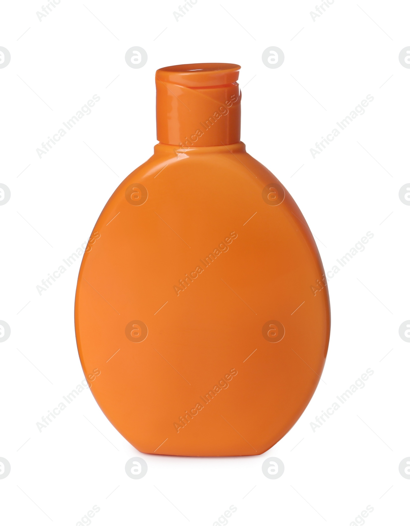 Photo of Orange plastic bottle of cosmetic product isolated on white