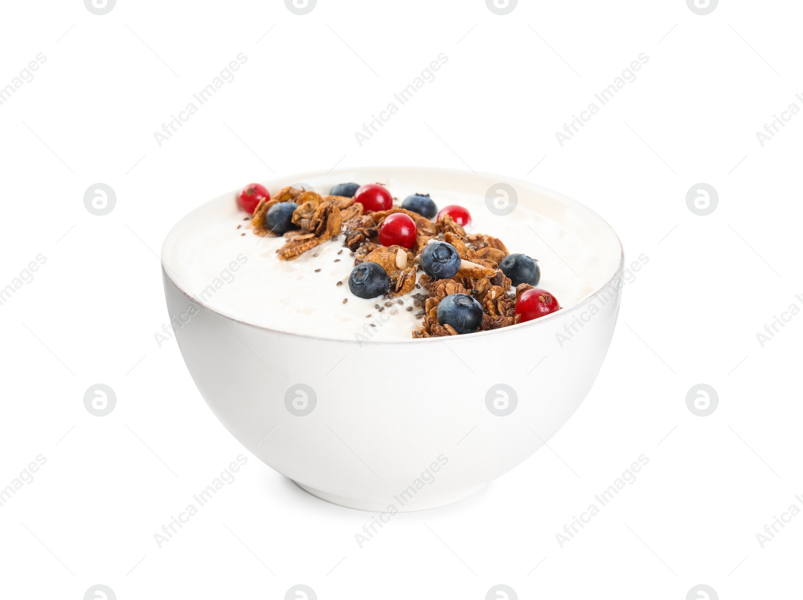 Photo of Delicious yogurt with granola and berries in bowl isolated on white