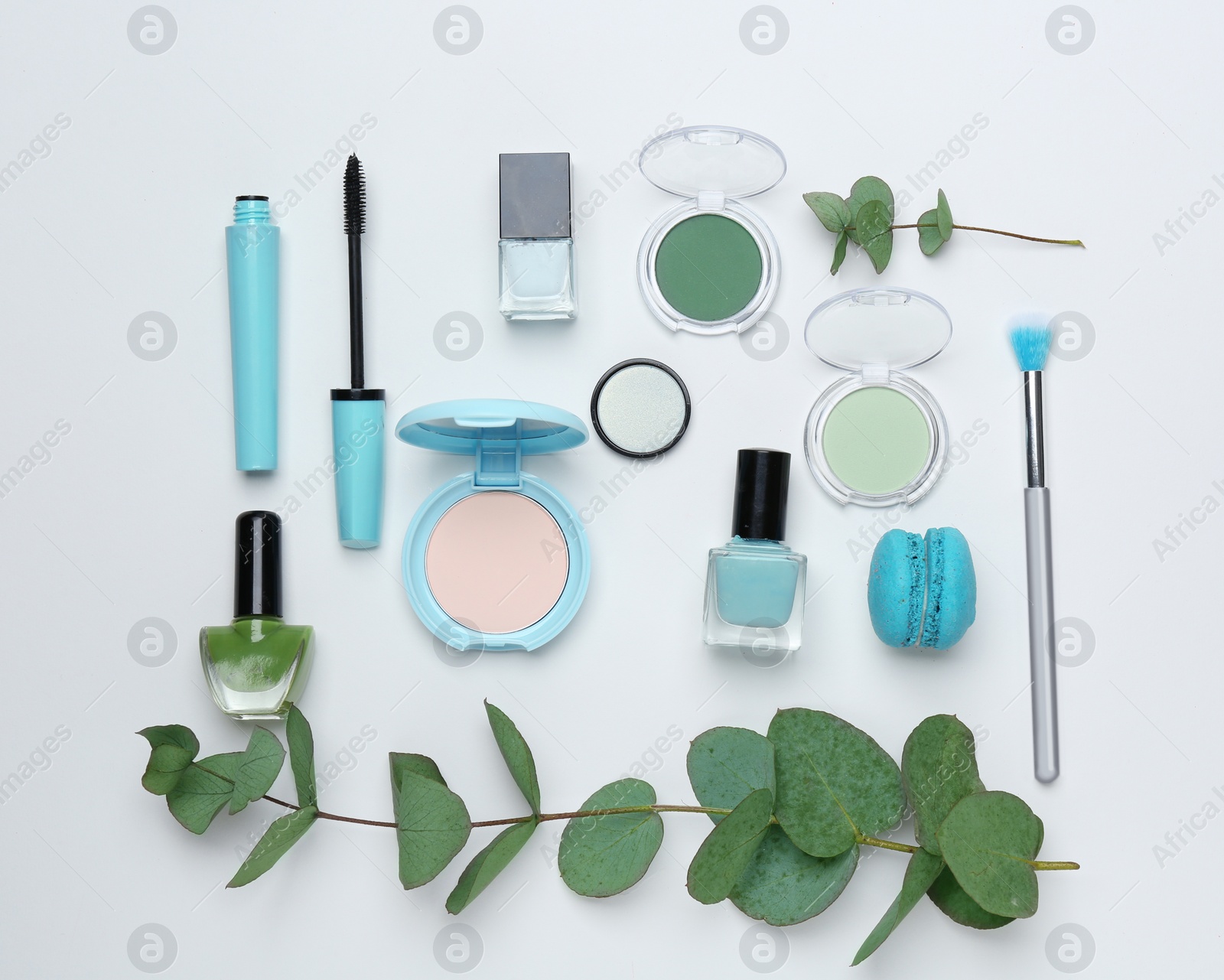 Photo of Decorative makeup products on white background