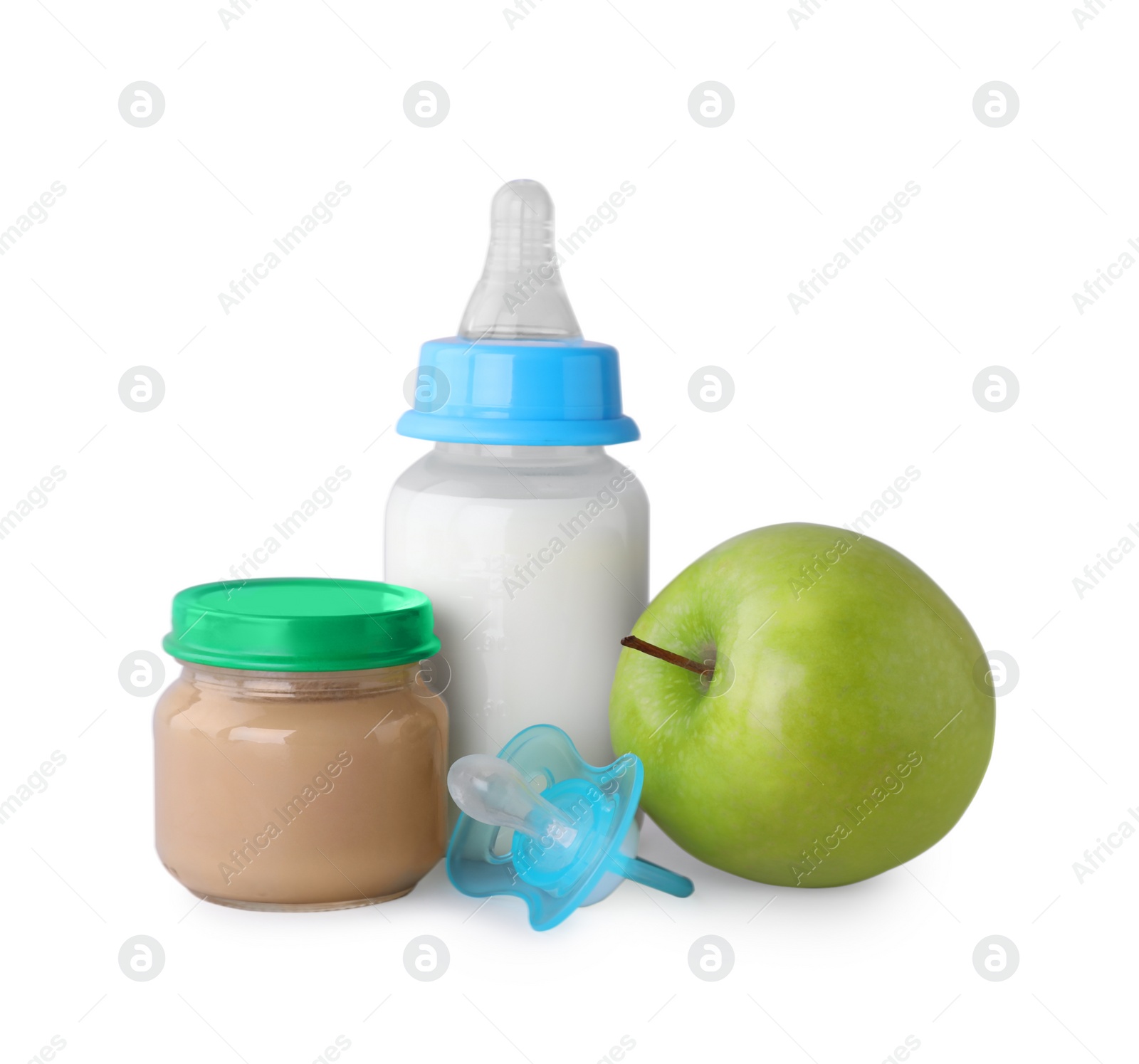 Photo of Healthy baby food, bottle with milk, apple and pacifier on light grey background