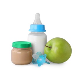 Photo of Healthy baby food, bottle with milk, apple and pacifier on light grey background