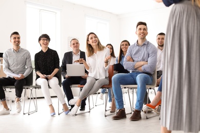 Young people having business training in office