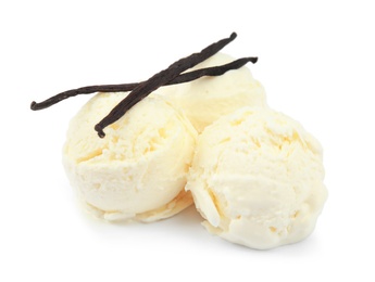 Balls of delicious ice cream with vanilla pods on white background