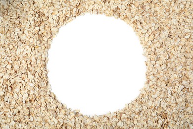 Photo of Frame of raw oatmeal on white background, top view. Space for text