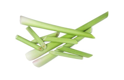 Fresh aromatic lemongrass stalks on white background, top view