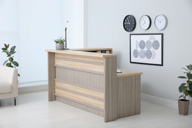 Lobby interior with stylish wooden receptionist desk