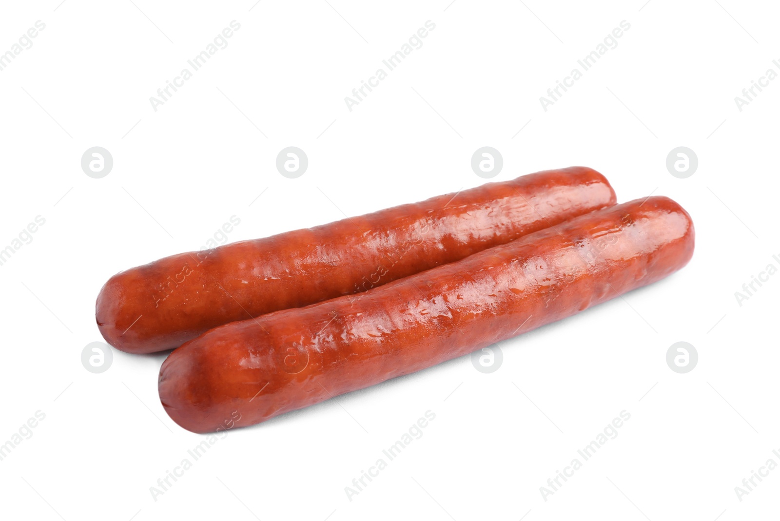 Photo of Delicious grilled sausages on white background. Barbecue food