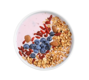 Photo of Smoothie bowl with goji berries on white background, top view