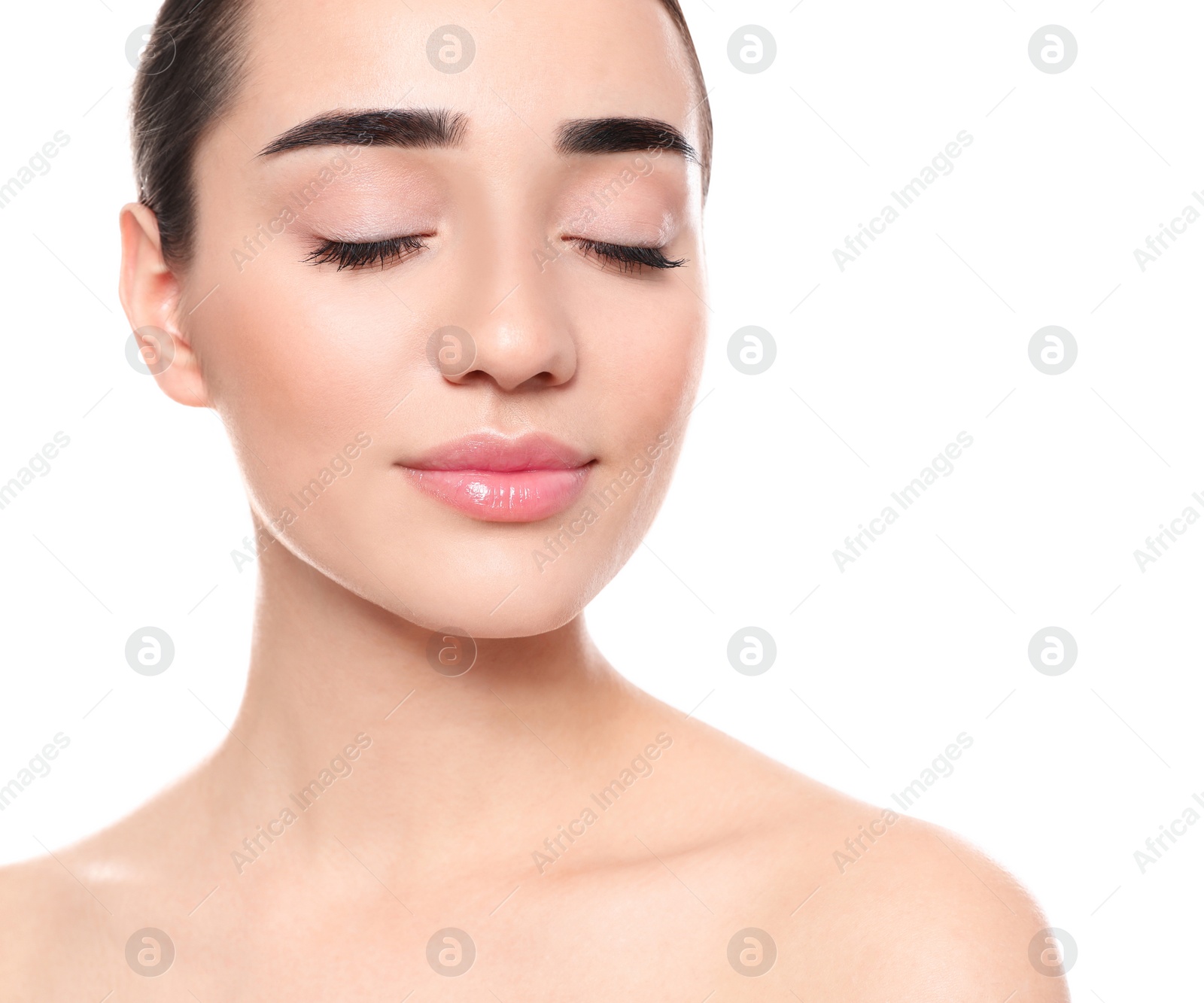 Photo of Portrait of young woman with beautiful face against white background