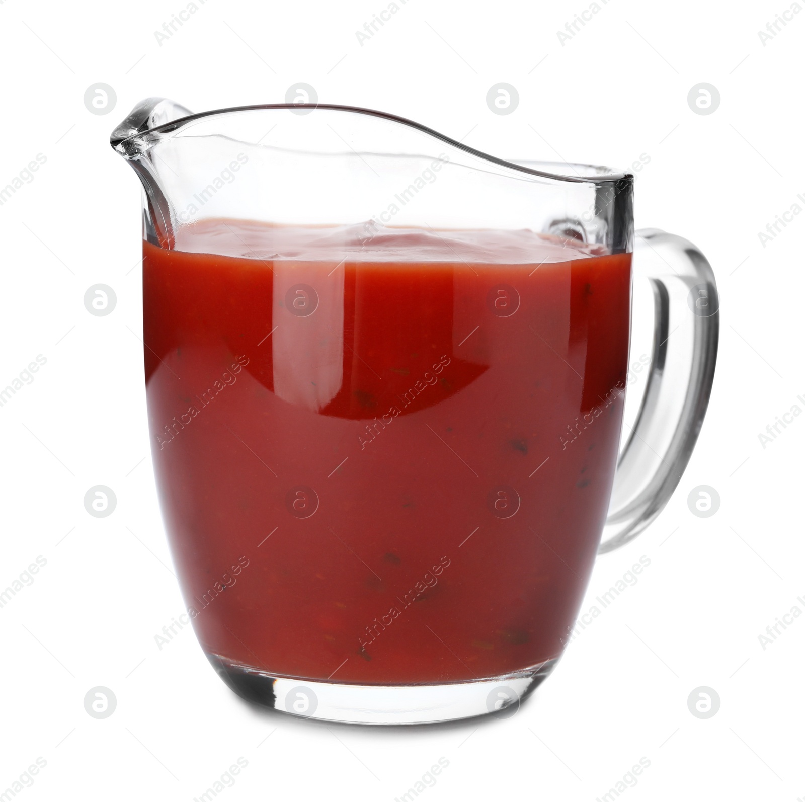 Photo of Jug of spicy chili sauce on white background