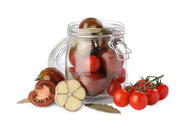 Photo of Pickling jar with fresh ripe cherry tomatoes and spices on white background