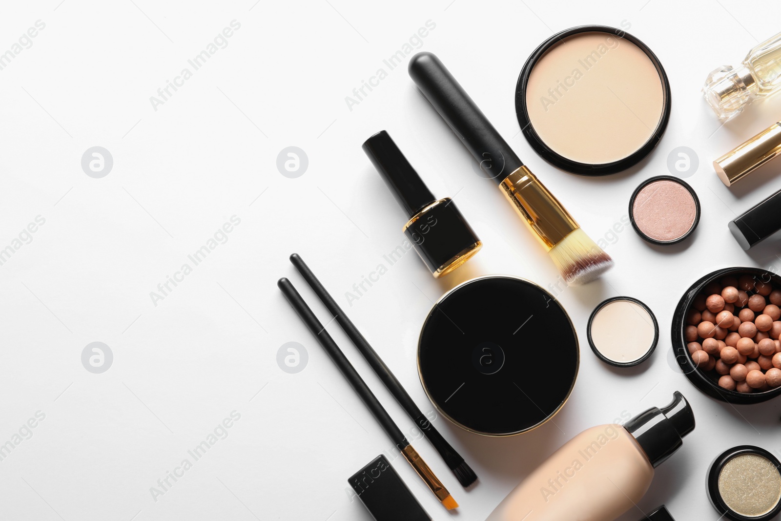Photo of Set of luxury makeup products on white background, flat lay