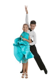 Beautifully dressed couple of kids dancing on white background