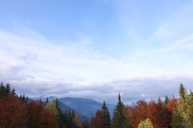 Photo of Picturesque view of majestic mountains on cloudy day