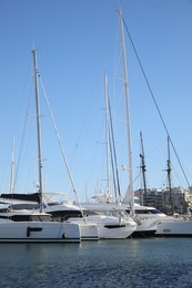 Picturesque view of port with modern boats on sunny day