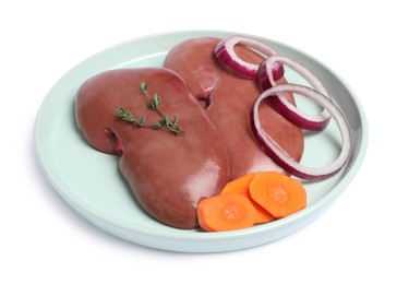 Photo of Fresh raw kidneys with thyme, onion and carrot on white background