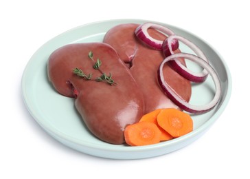 Fresh raw kidneys with thyme, onion and carrot on white background