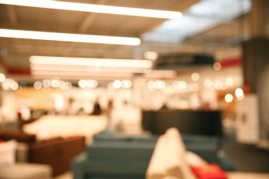 Blurred view of modern shopping mall interior