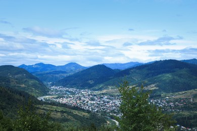 Photo of Picturesque view of beautiful mountains under cloudy sky