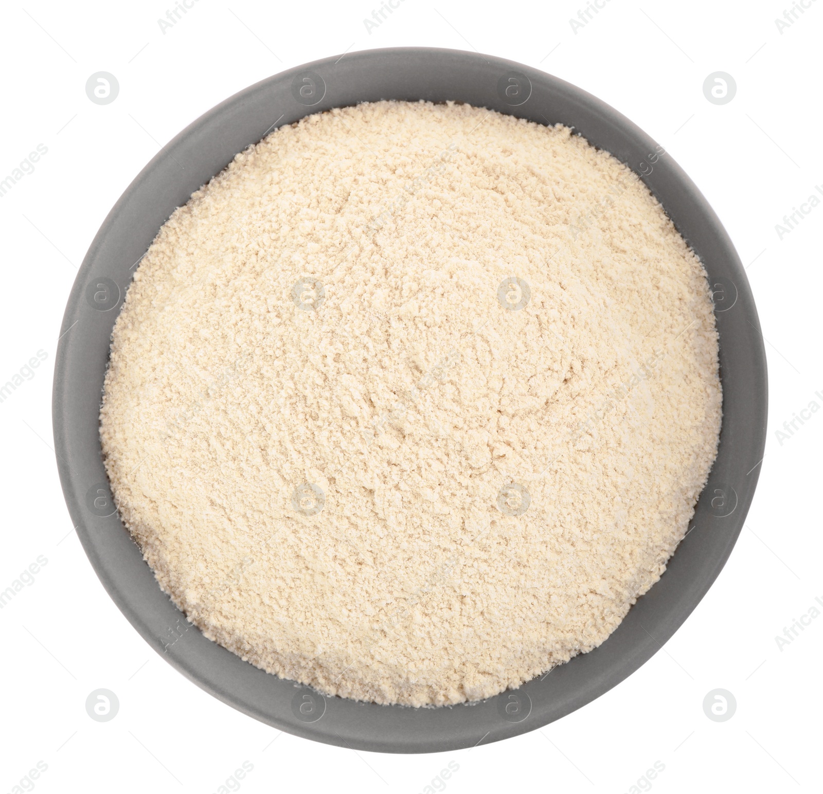 Photo of Ceramic bowl with quinoa flour on white background, top view