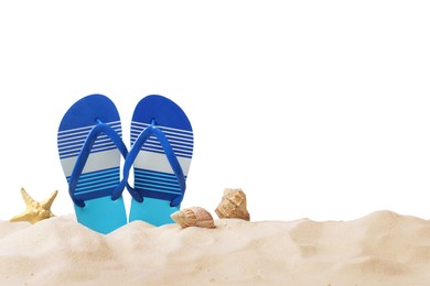Photo of Striped flip flops, starfish and sea shells on sand against white background