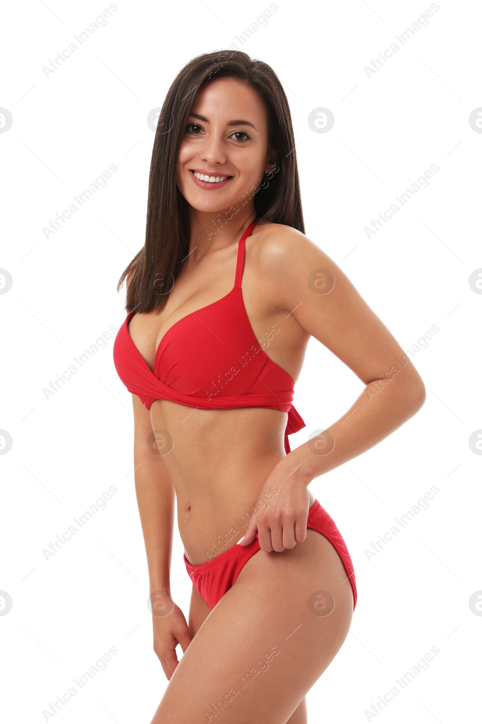 Photo of Pretty sexy woman with slim body in stylish red bikini on white background