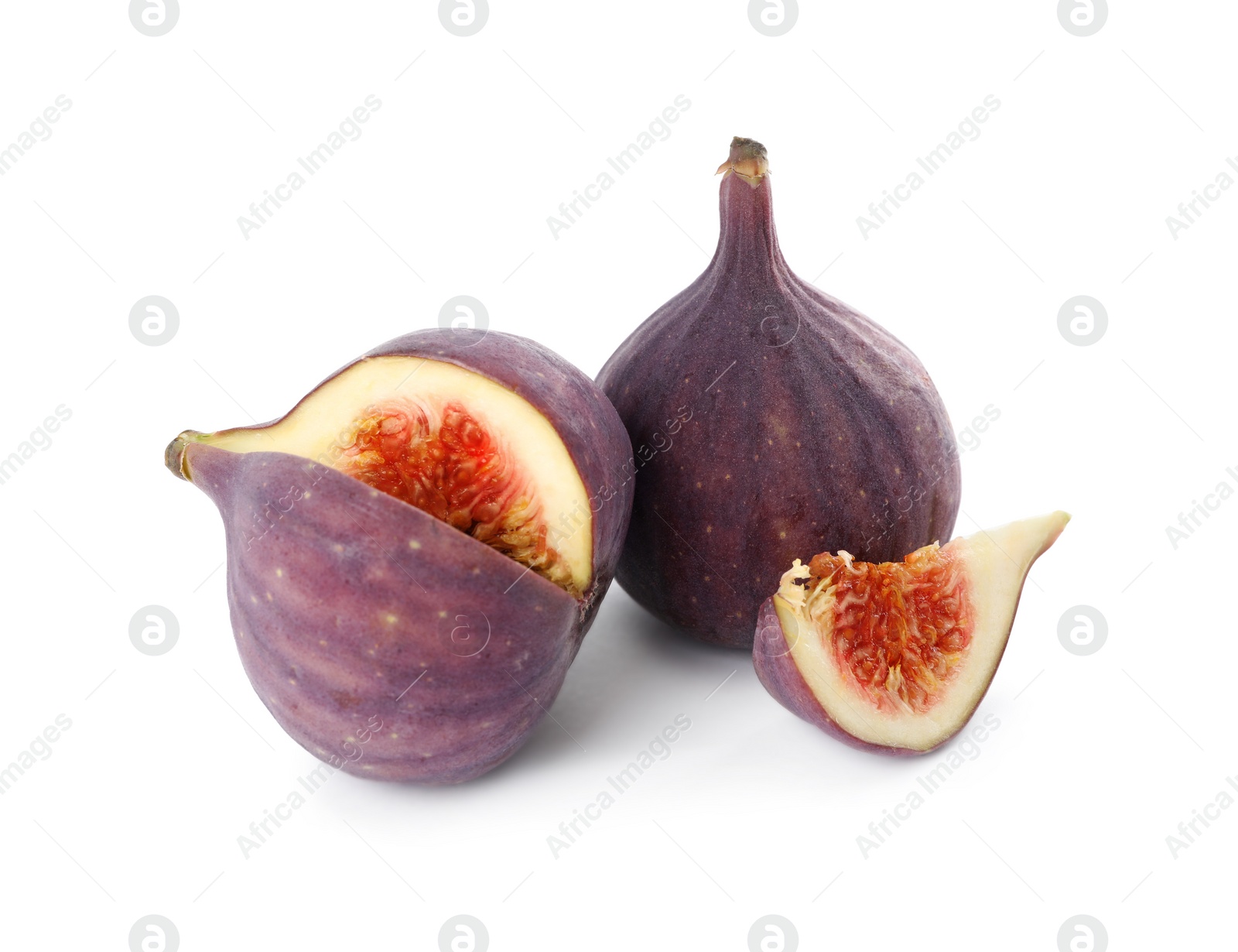 Photo of Whole and cut tasty fresh figs isolated on white