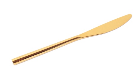 Photo of Stylish clean gold knife on white background
