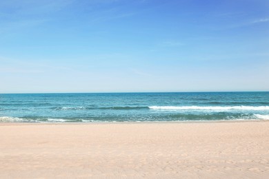 Photo of Picturesque view of beautiful sea and sandy beach on sunny day