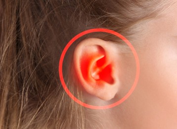 Image of Little girl suffering from earache, closeup view