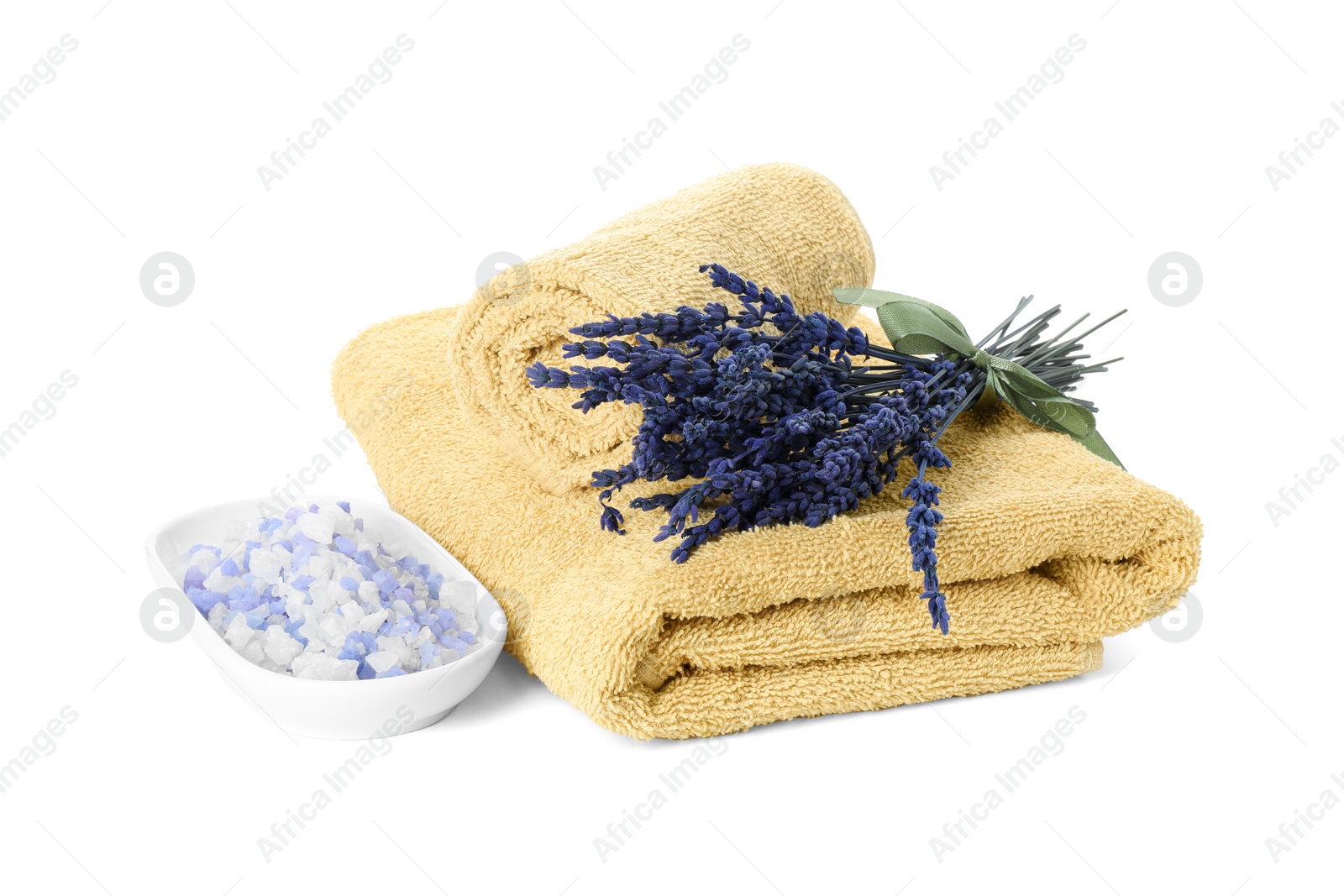 Photo of Spa composition. Towels, sea salt and lavender flowers on white background