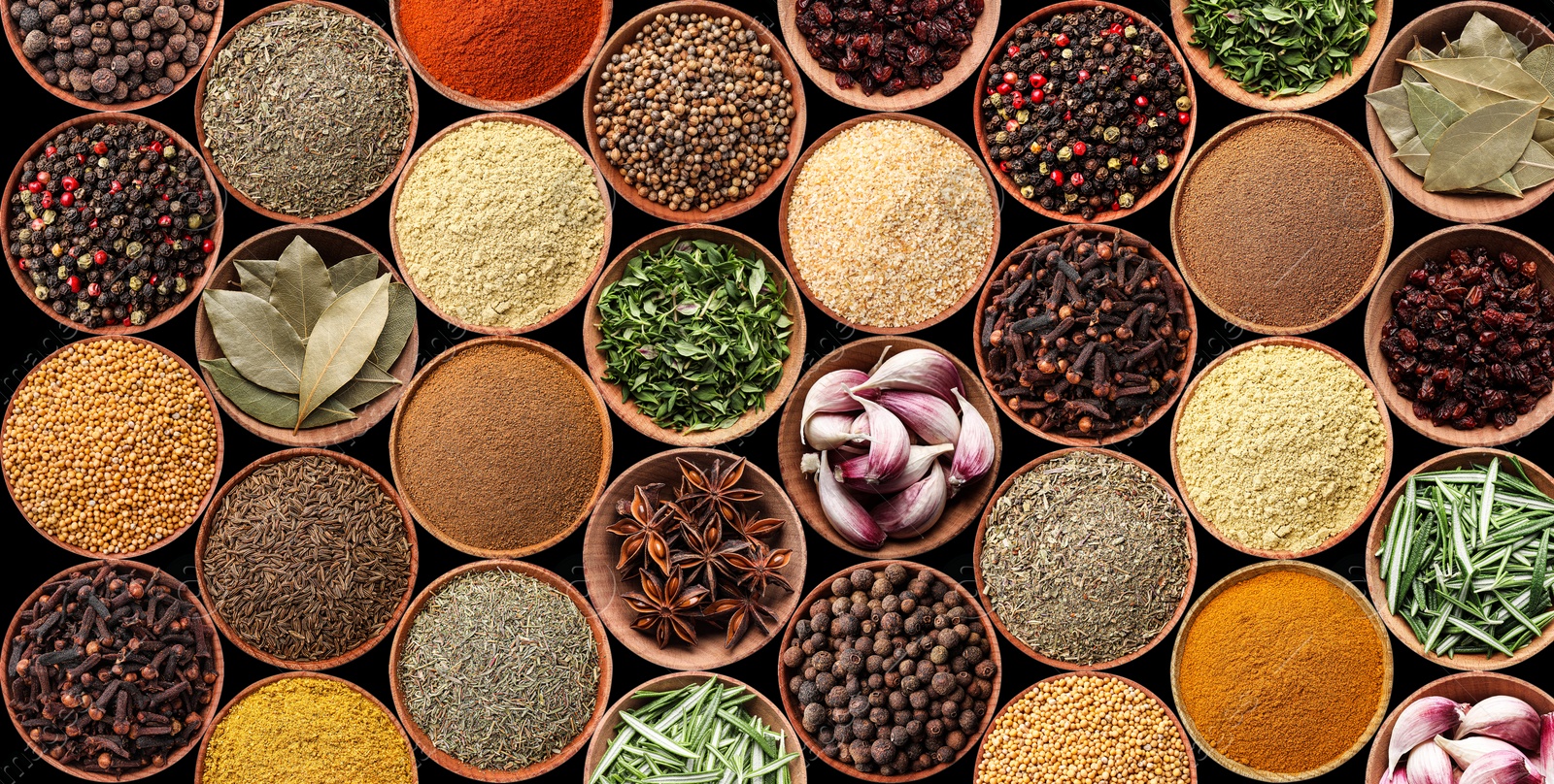 Image of Collection of different aromatic spices and herbs on black background, flat lay