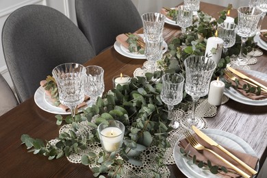 Stylish elegant table setting for festive dinner indoors