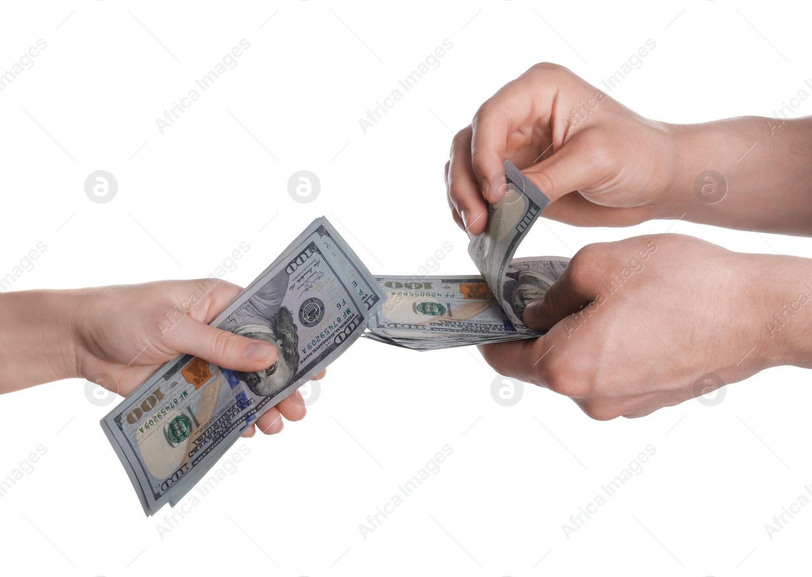 Photo of Money exchange. Man giving dollar banknotes to woman on white background, closeup