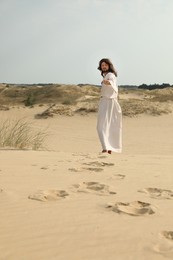 Photo of Jesus Christ walking in desert on sunny day
