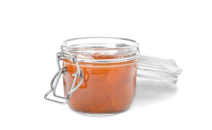 Photo of Jar with delicious apricot jam on white background