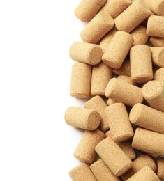 Photo of Wine bottle corks on white background, top view