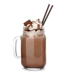 Photo of Mason jar with delicious milk shake on white background