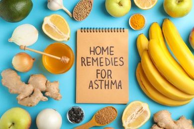 Photo of Natural products and notebook with text HOME REMEDIES FOR ASTHMA on color background, flat lay