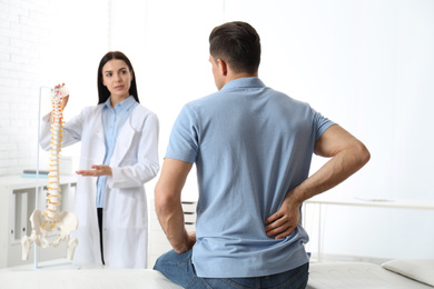Photo of Man visiting professional orthopedist in medical office