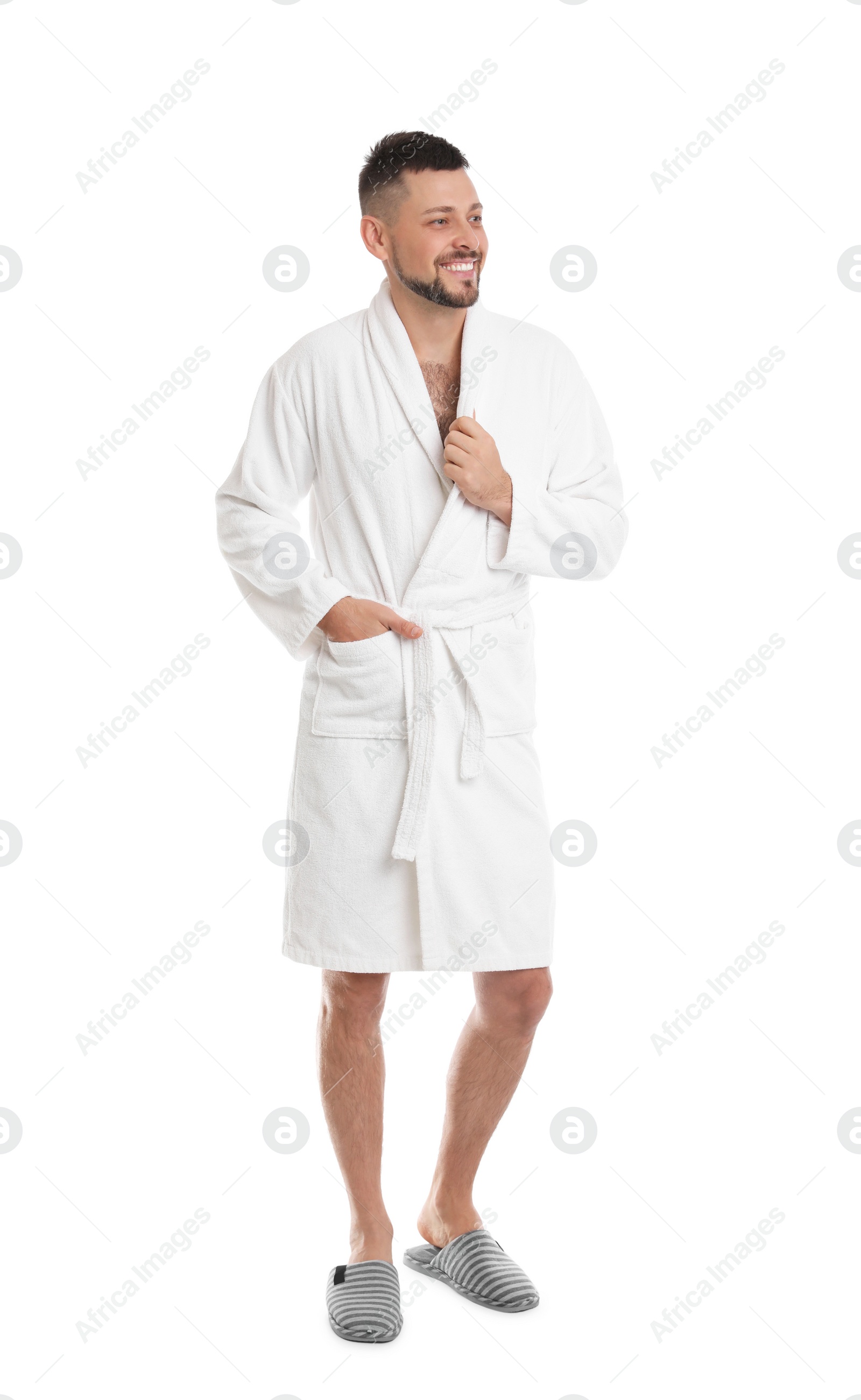 Photo of Handsome man wearing bathrobe on white background