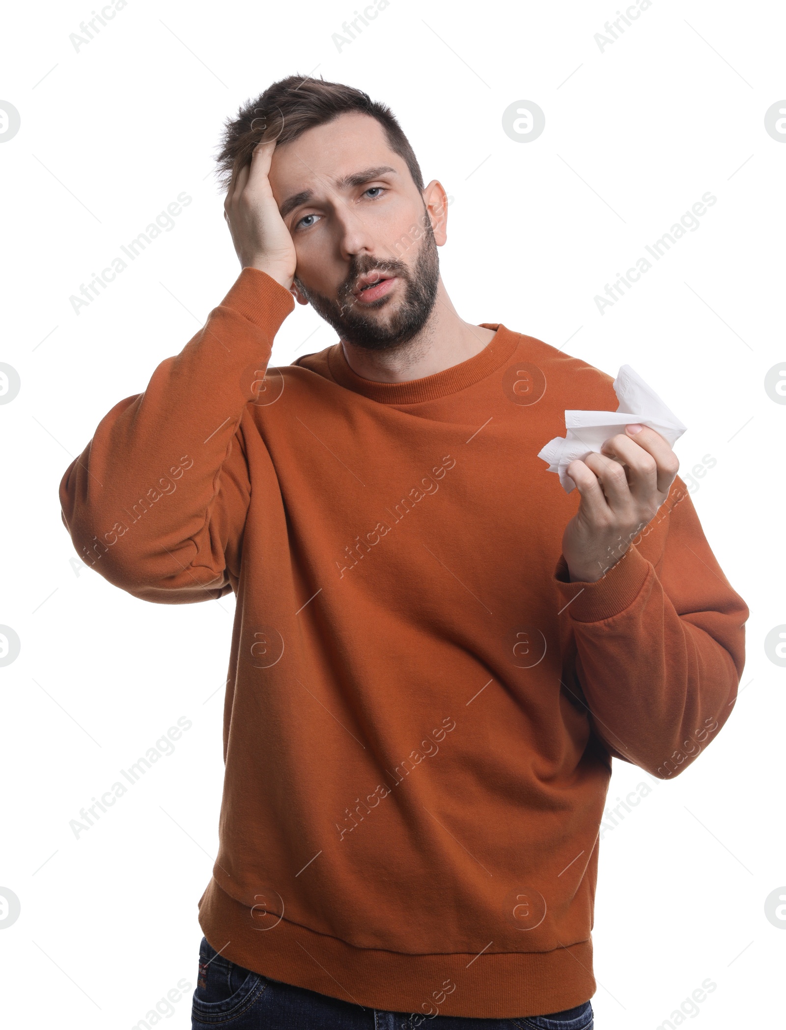 Photo of Man with tissue suffering from cold on white background