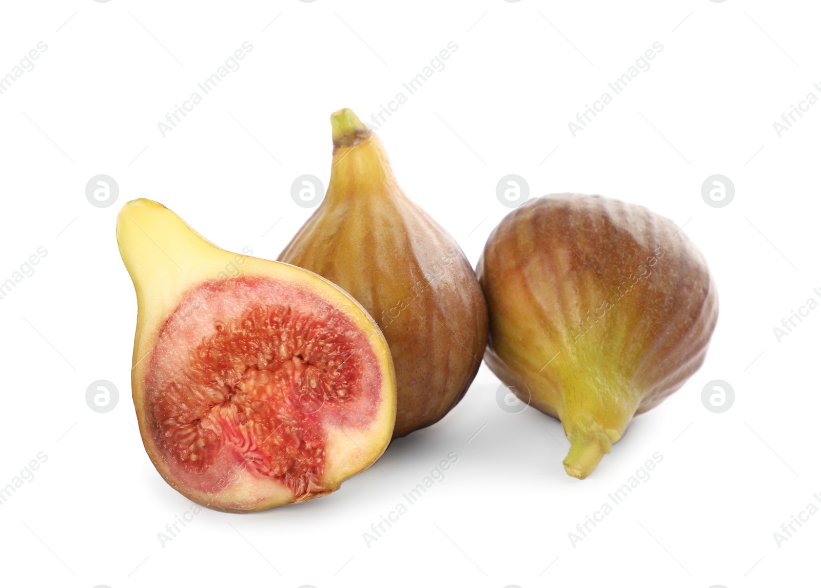 Photo of Whole and cut tasty figs isolated on white