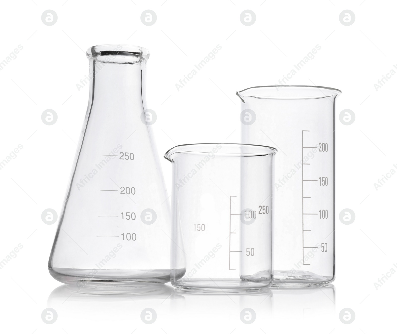 Photo of Clean empty laboratory glassware on white background