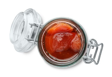 Tasty homemade quince jam in jar isolated on white, top view