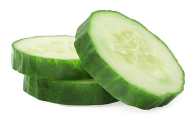 Photo of Slices of fresh cucumber isolated on white